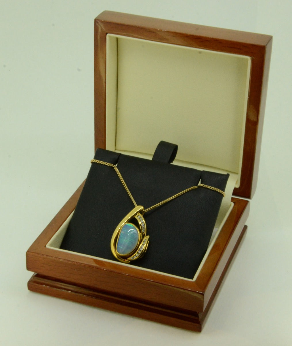 18ct Yellow Gold Solid Crystal Opal Pendant with Brilliant Cut Diamonds 18ct Yellow Gold Solid Crystal Opal Pendant with Brilliant Cut Diamonds