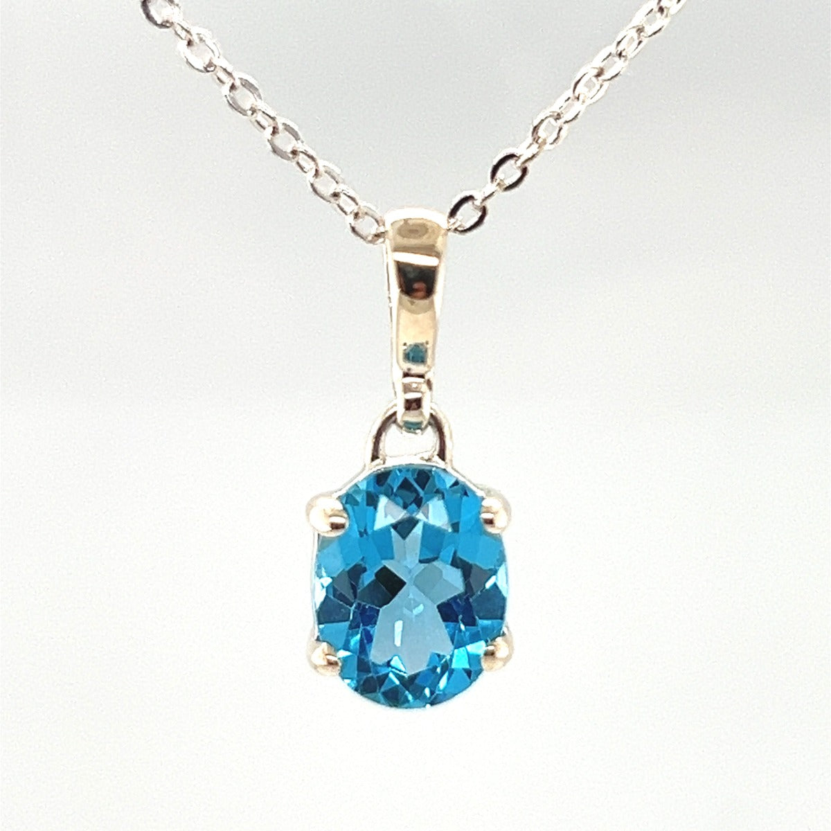 Sterling Silver Blue Topaz Pendant (stp900)