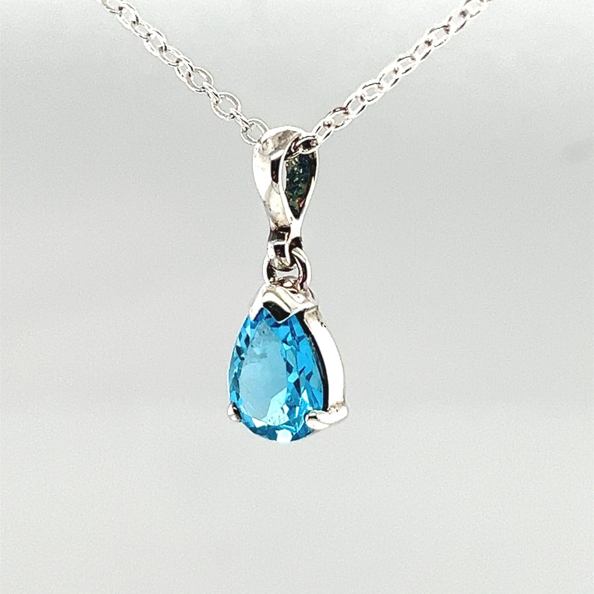 Sterling Silver Blue Topaz Pendant (stp148)