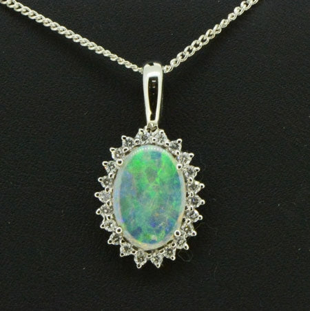 18ct White Gold Solid Opal Pendant Surrounded by Diamonds