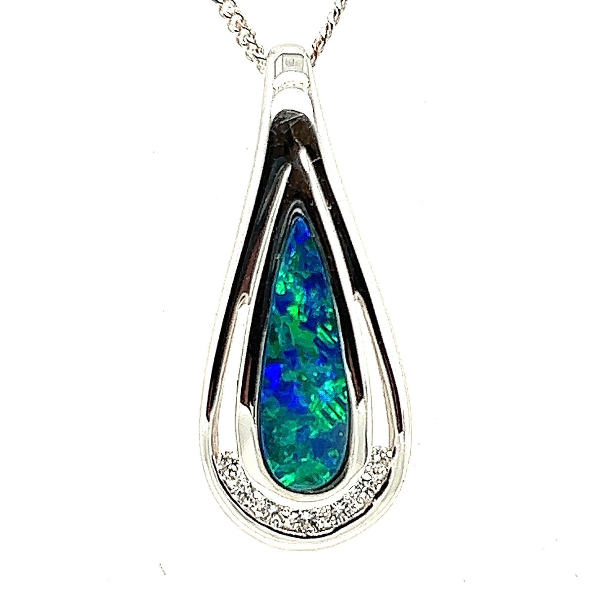 18ct white gold doublet opal pendant set with seven diamonds