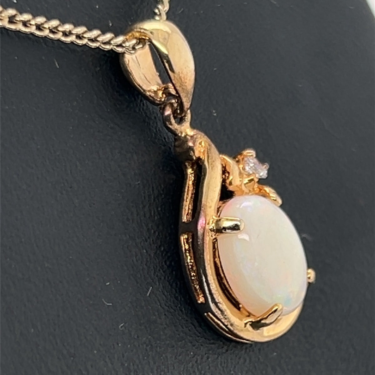 GOLD PLATED SOLID OPAL PENDANT WITH A CUT CRYSTAL (gpsp2420)