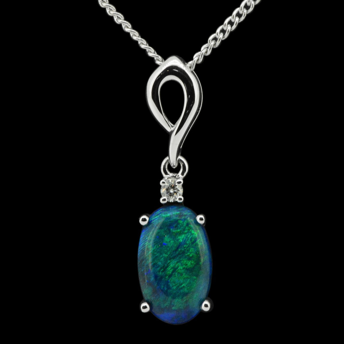 18ct white gold black opal pendant (11mmx7mm)