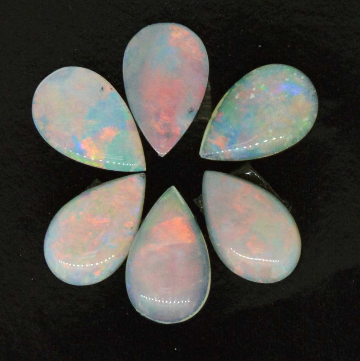 6 tear drop solid opals 3.95ct (so6306)