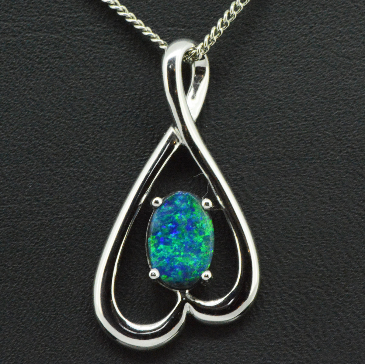 14ct white gold black opal pendant (12mmx7mm)