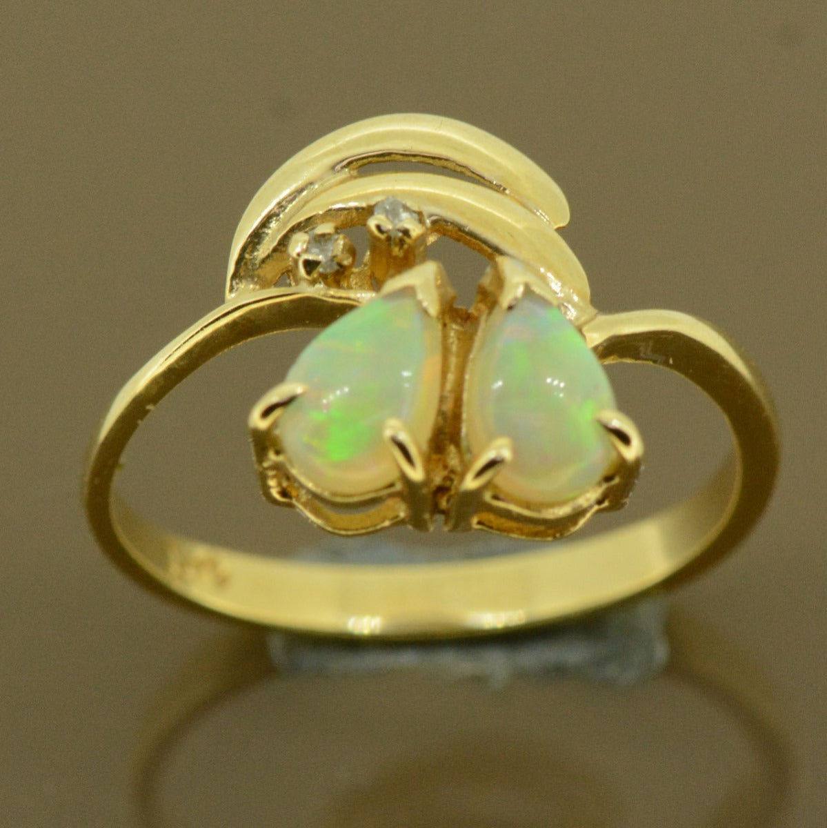 14ct solid opal ladies ring with diamonds