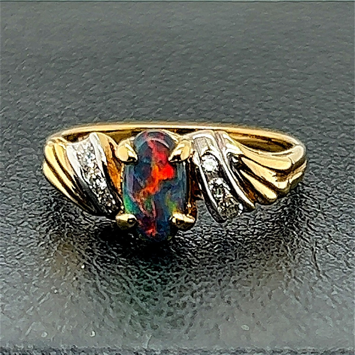 18ct yellow gold black opal ring (8x4)