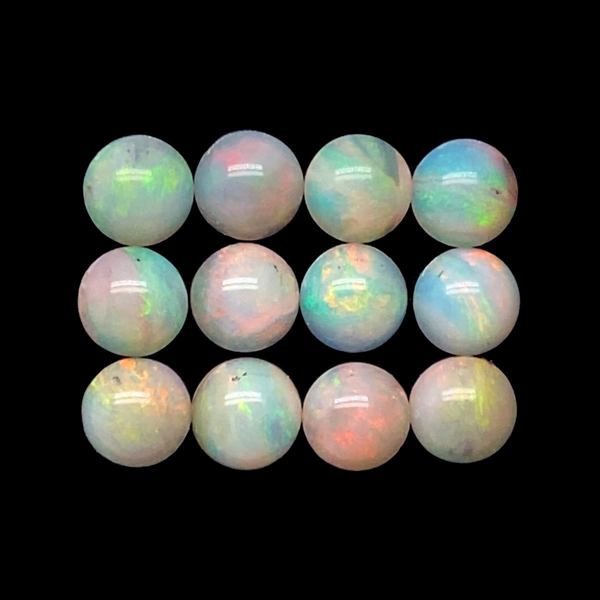 12 Solid Crystal Opals 4.22ct