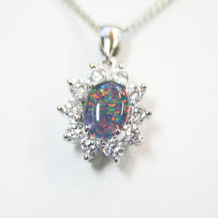 Triplet Opal Pendant Set In Sterling Silver Surrounded By Crystals